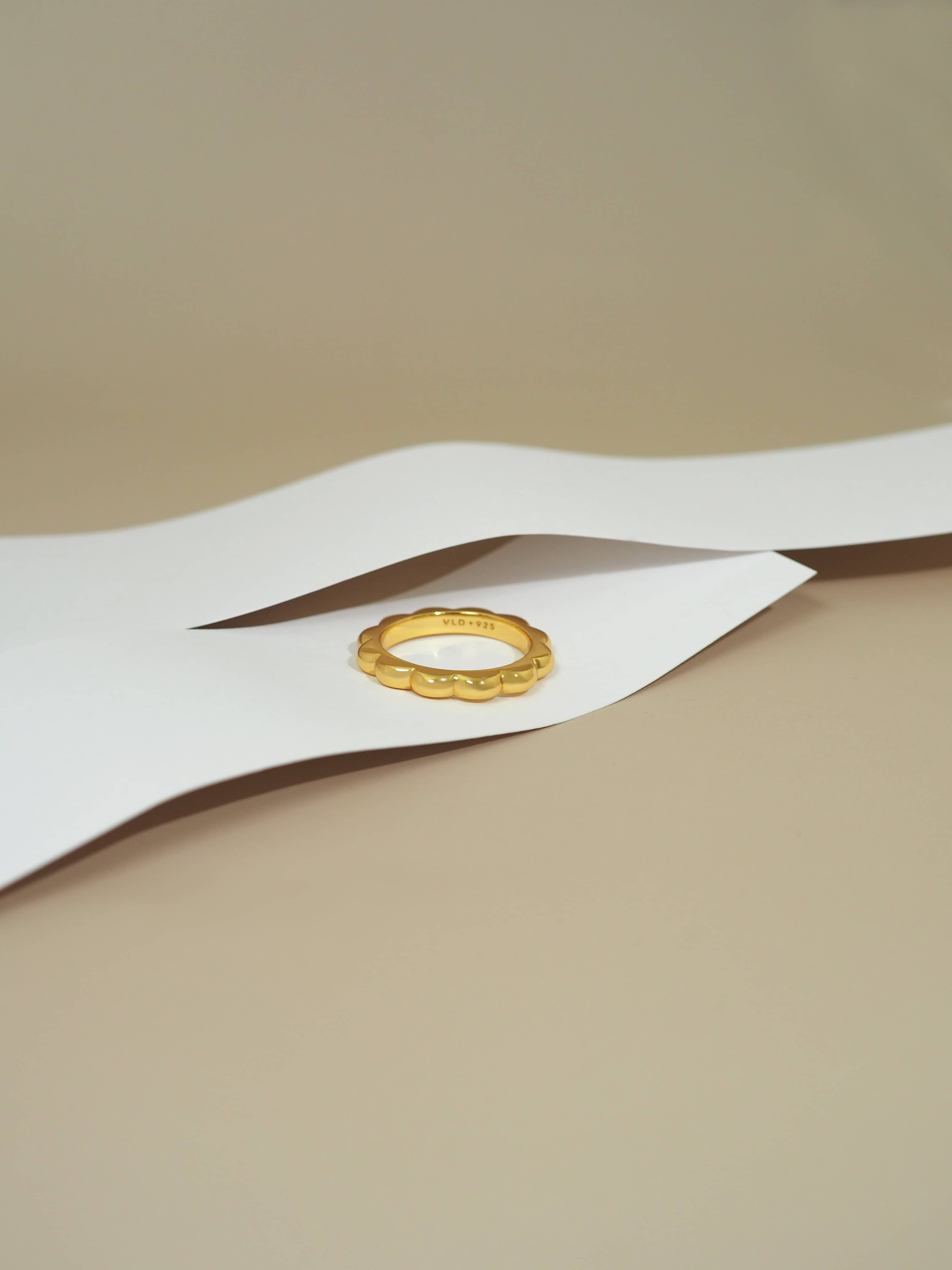 Minimal gold-plated stacking ring with an organic design for everyday look.