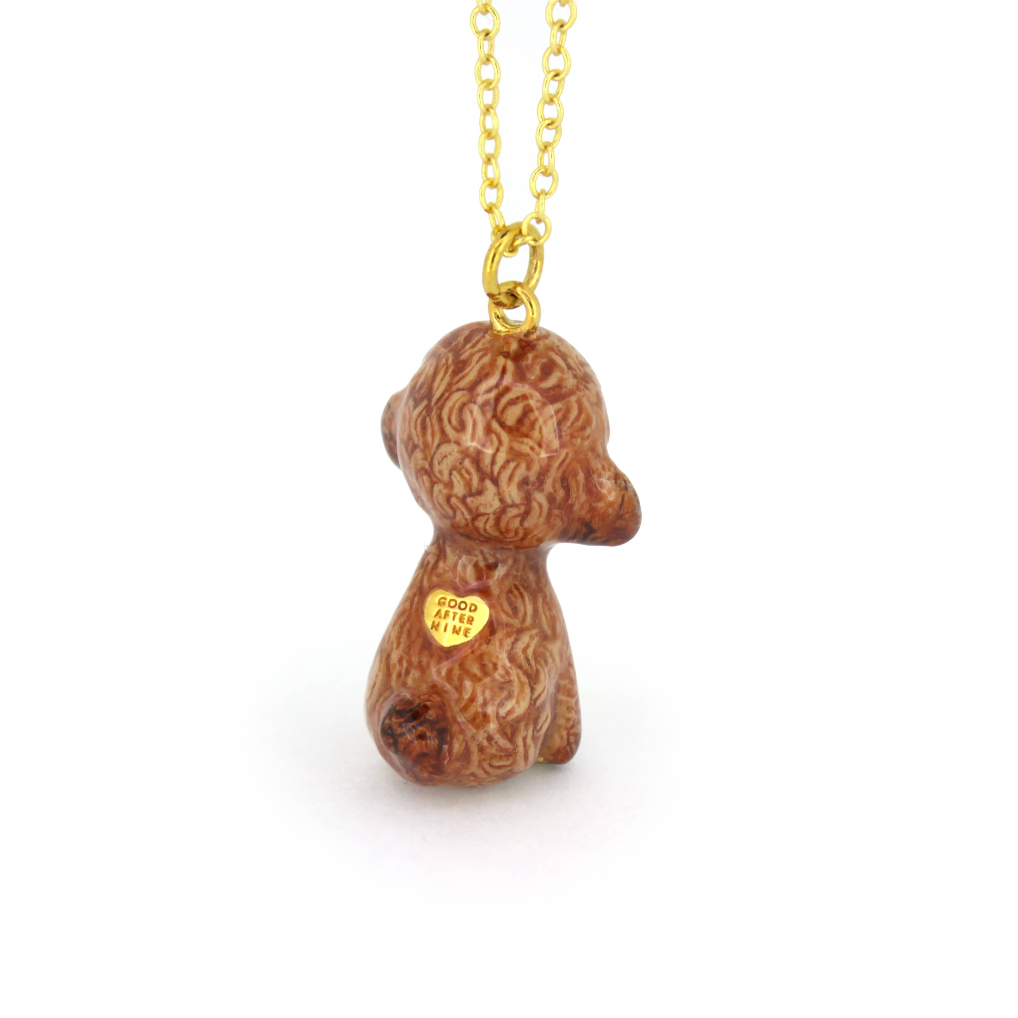 Handcrafted brown poodle pendant necklace with a cute design.