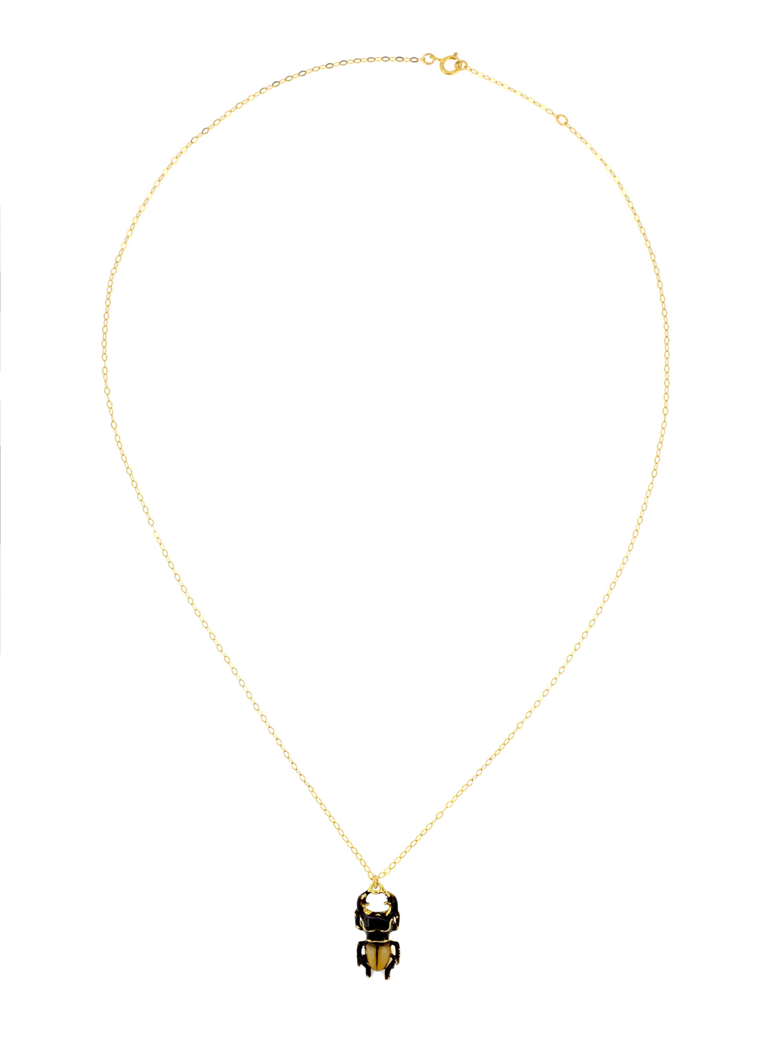 Beautiful gold stag beetle charm on a delicate chain necklace.