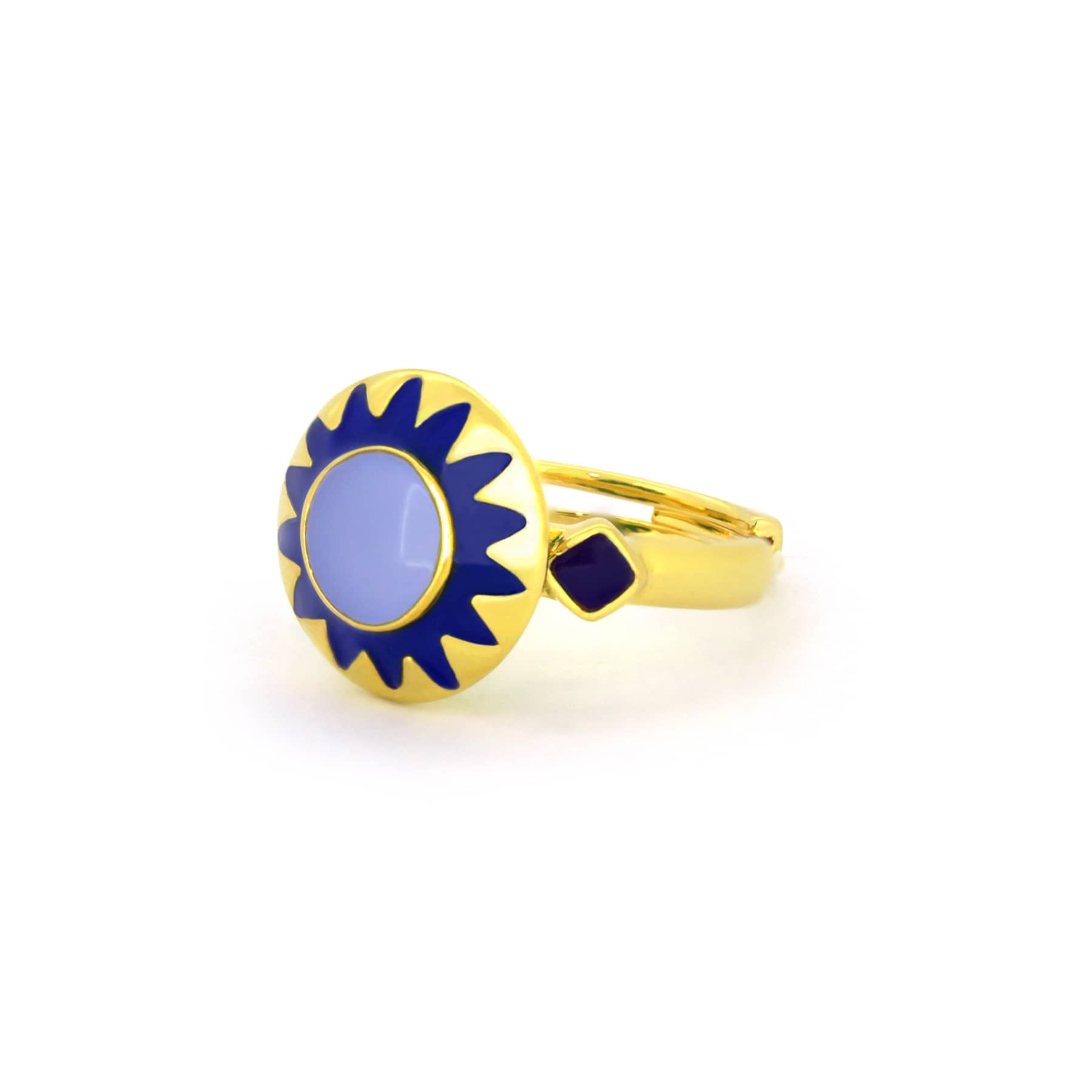 Unique gold ring with lavender and blue accents, inspired by winter.