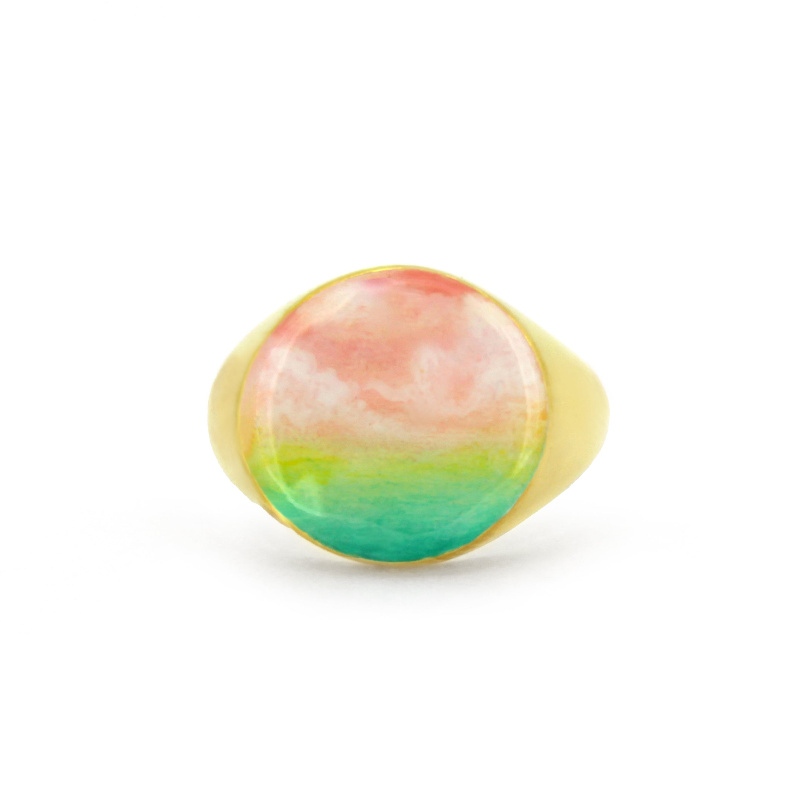 A beautiful hand-painted ring inspired by a colorful dawn with pink and green hues.