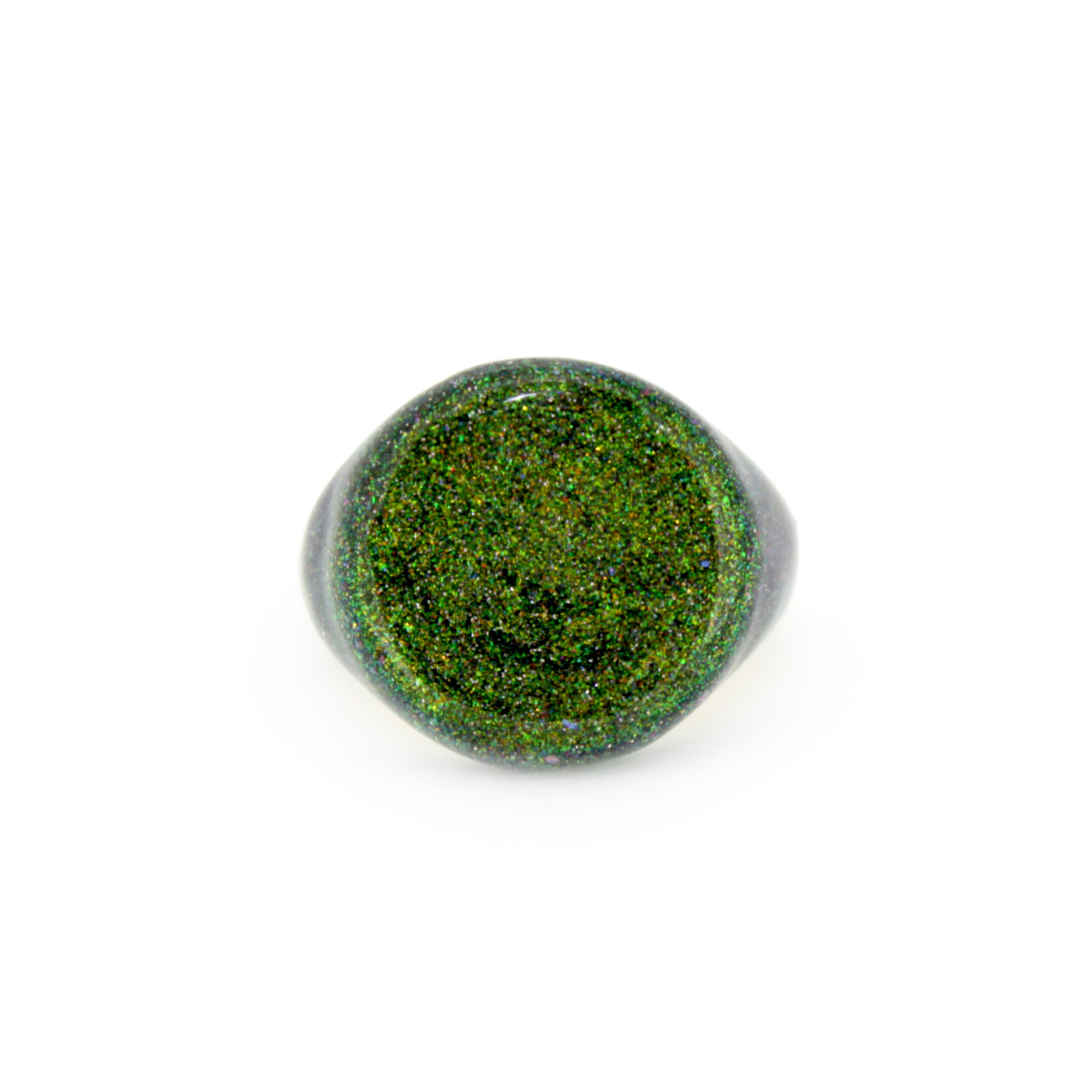 Green shimmering enamel ring inspired by the sky.