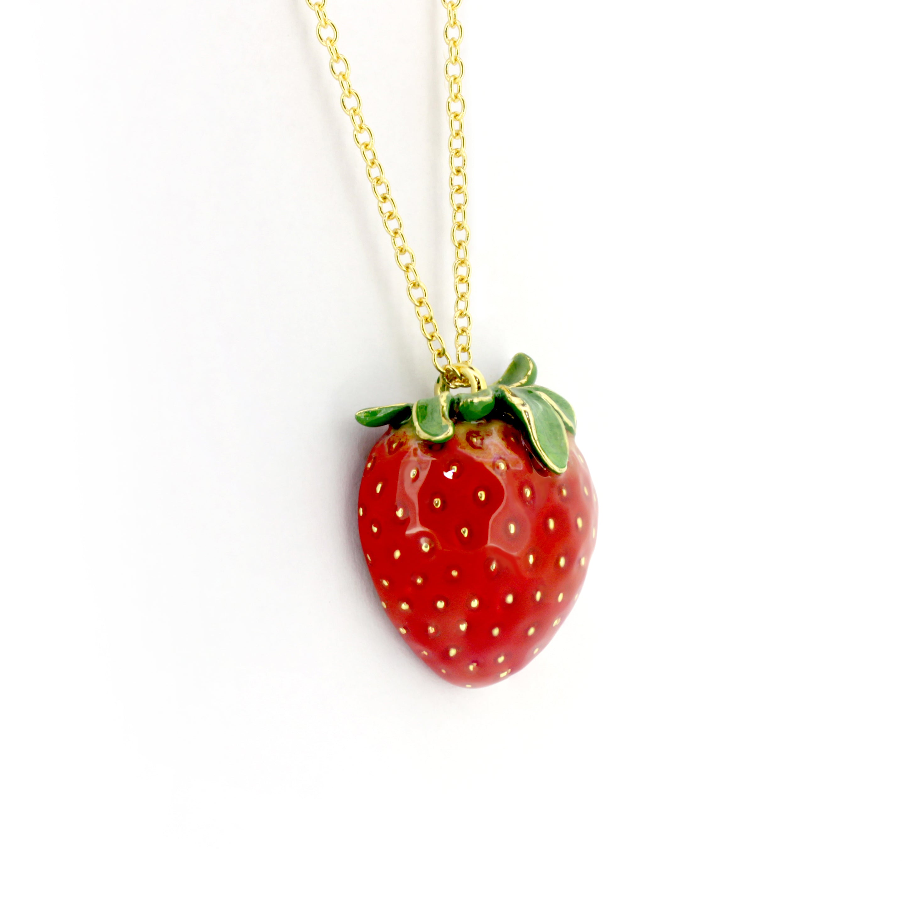 Bright red strawberry pendant with a gold chain necklace