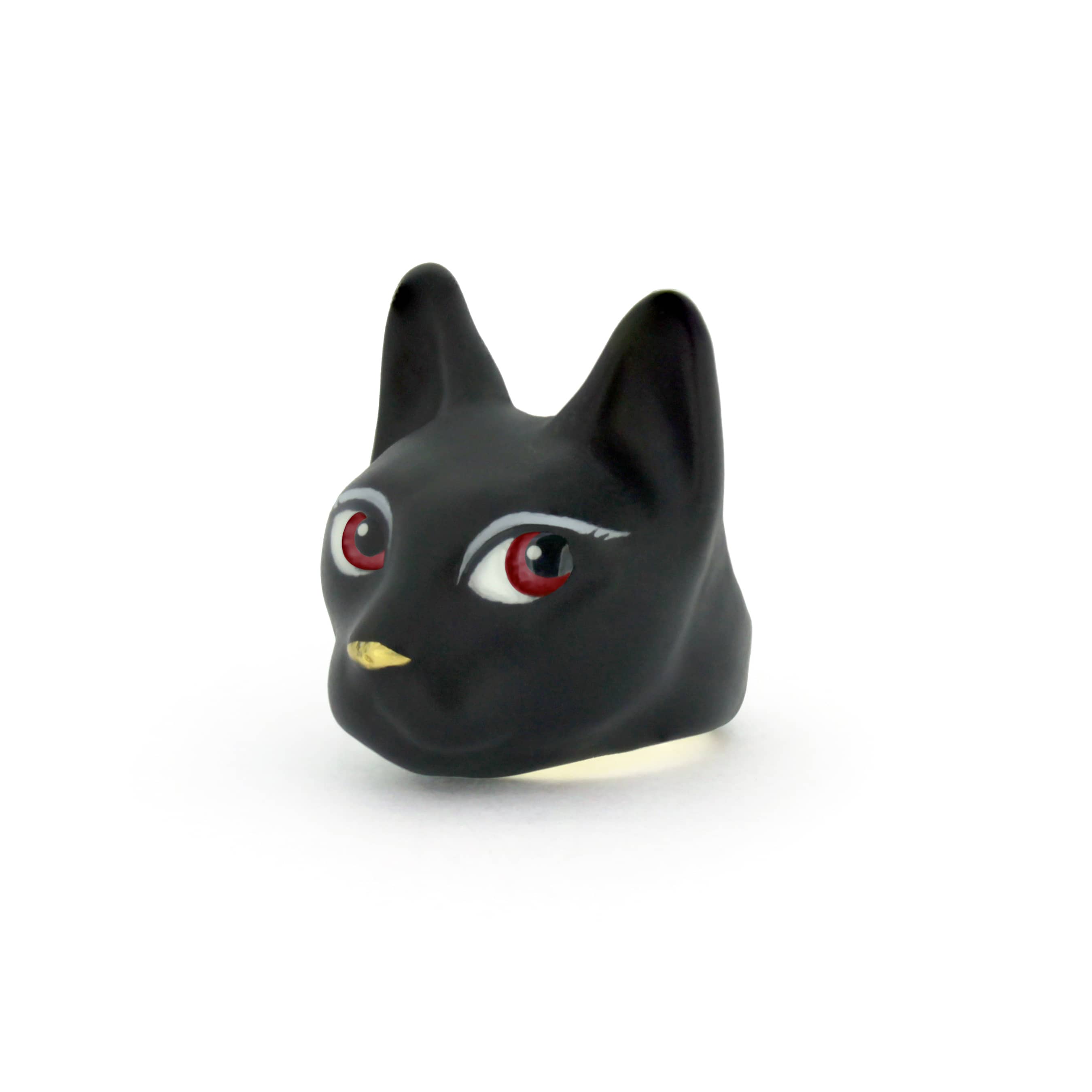 Artistic black cat ring with red eyes, perfect for art collectors.