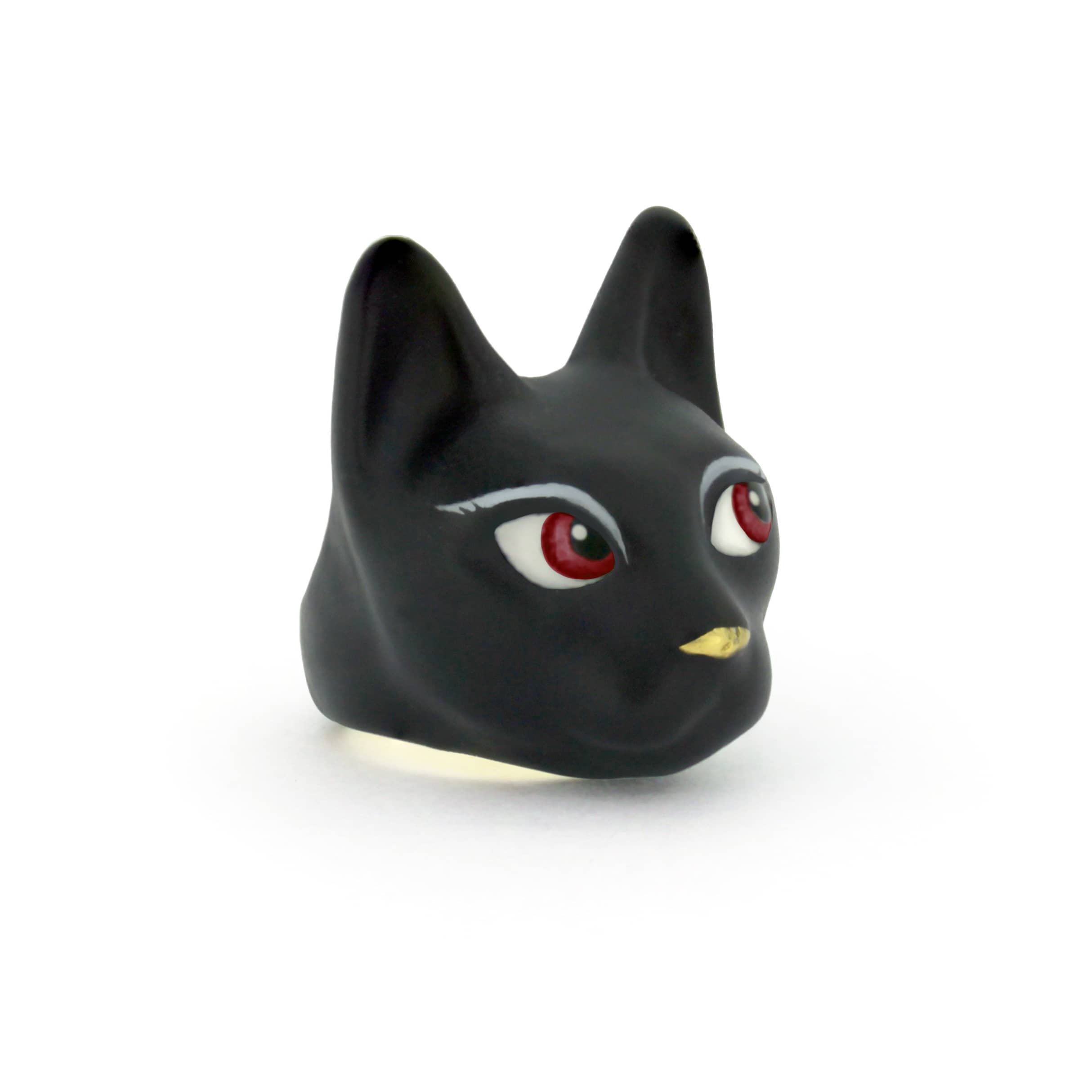 Charming hand-painted ring depicting a black cat with vibrant red eyes