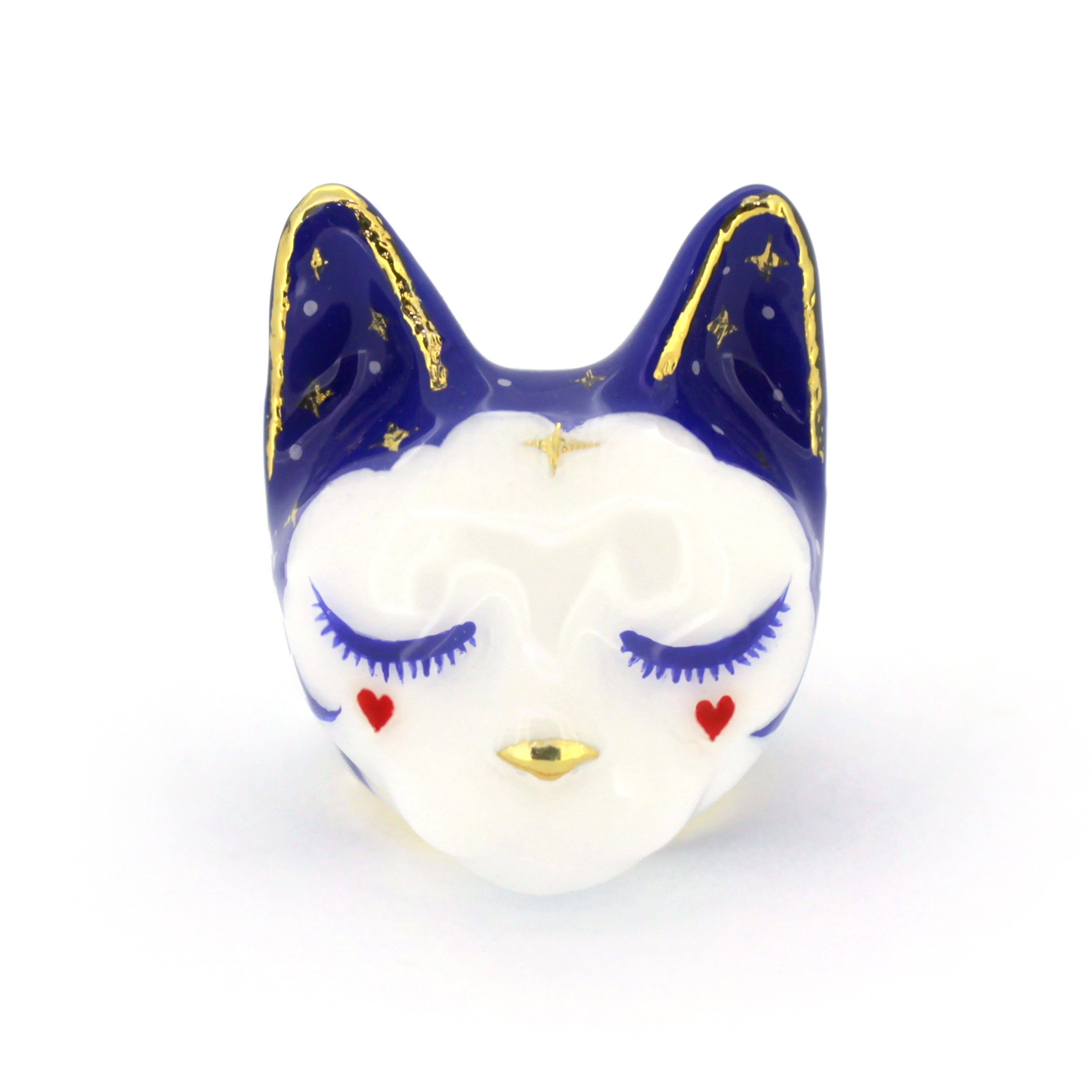 A cute sleepy cat ring with a dreamy expression and colorful design.
