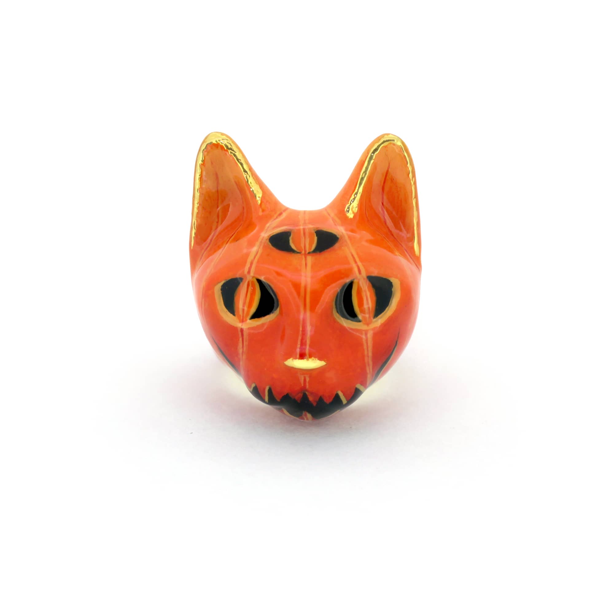 Halloween-themed ring inspired by a jack-o-lantern with cat features.