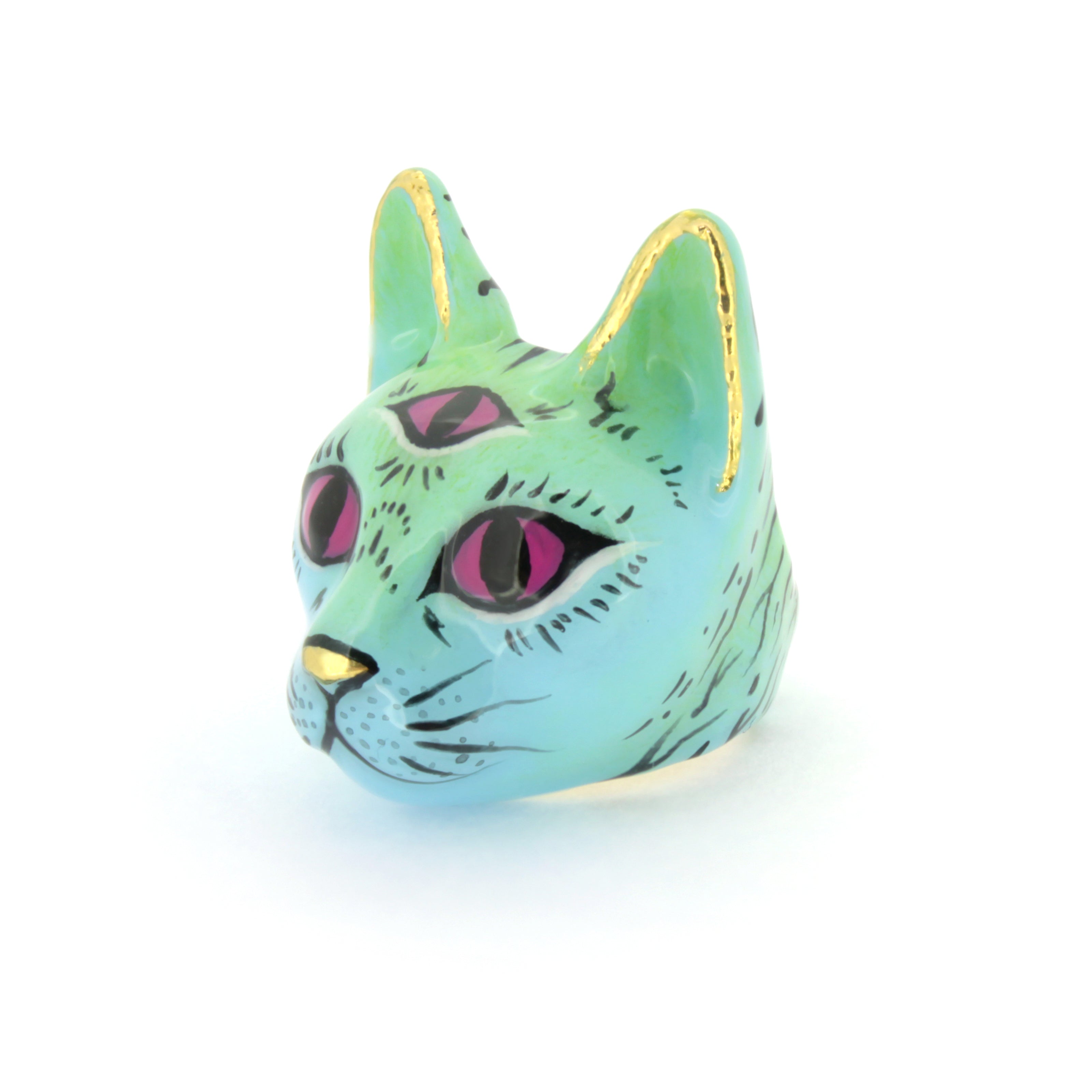 Unique cat ring painted in a vibrant green color, with a purple third eye design, perfect for cat lovers.
