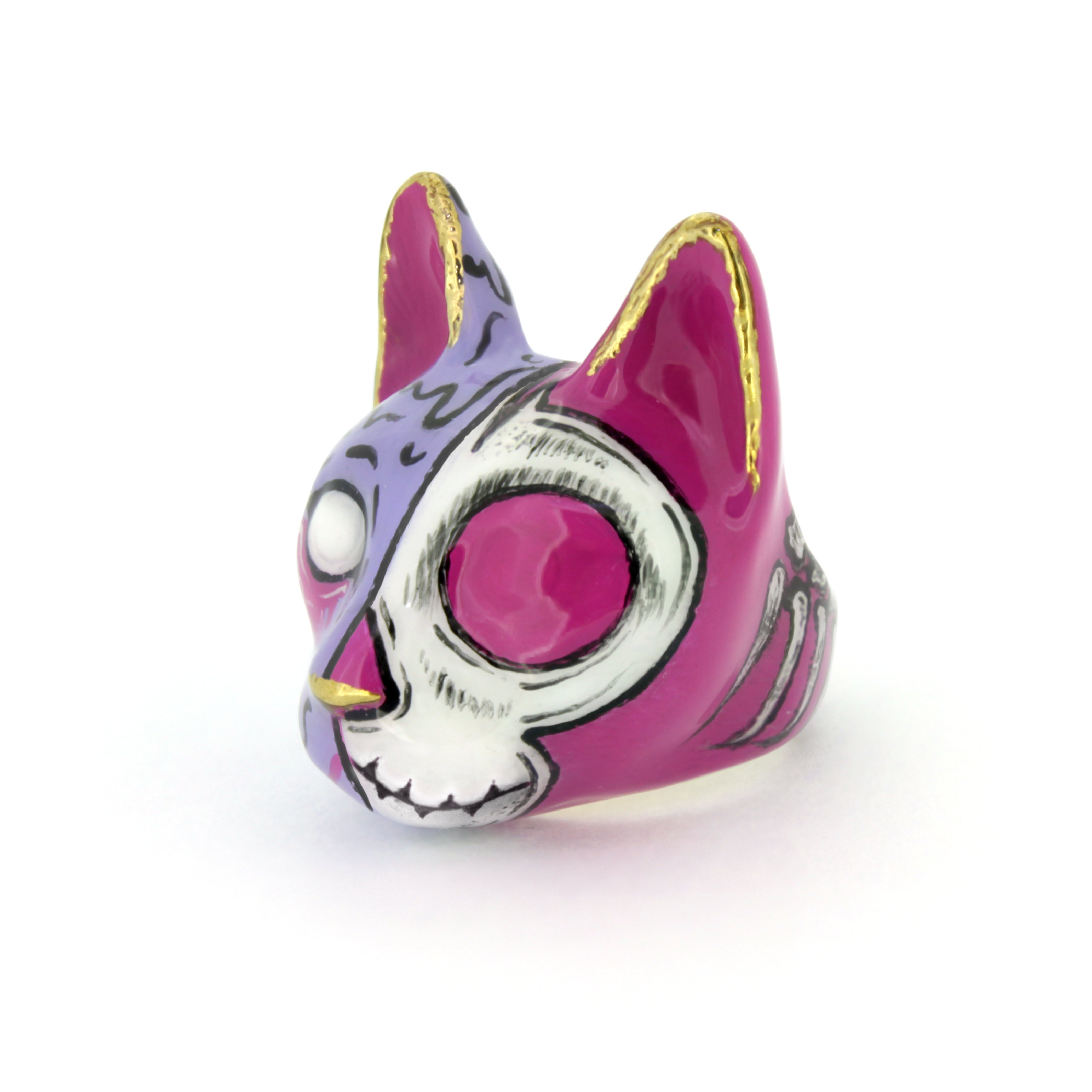 Colorful zombie cat ring with a split design, showcasing a stylized skull and vibrant colors
