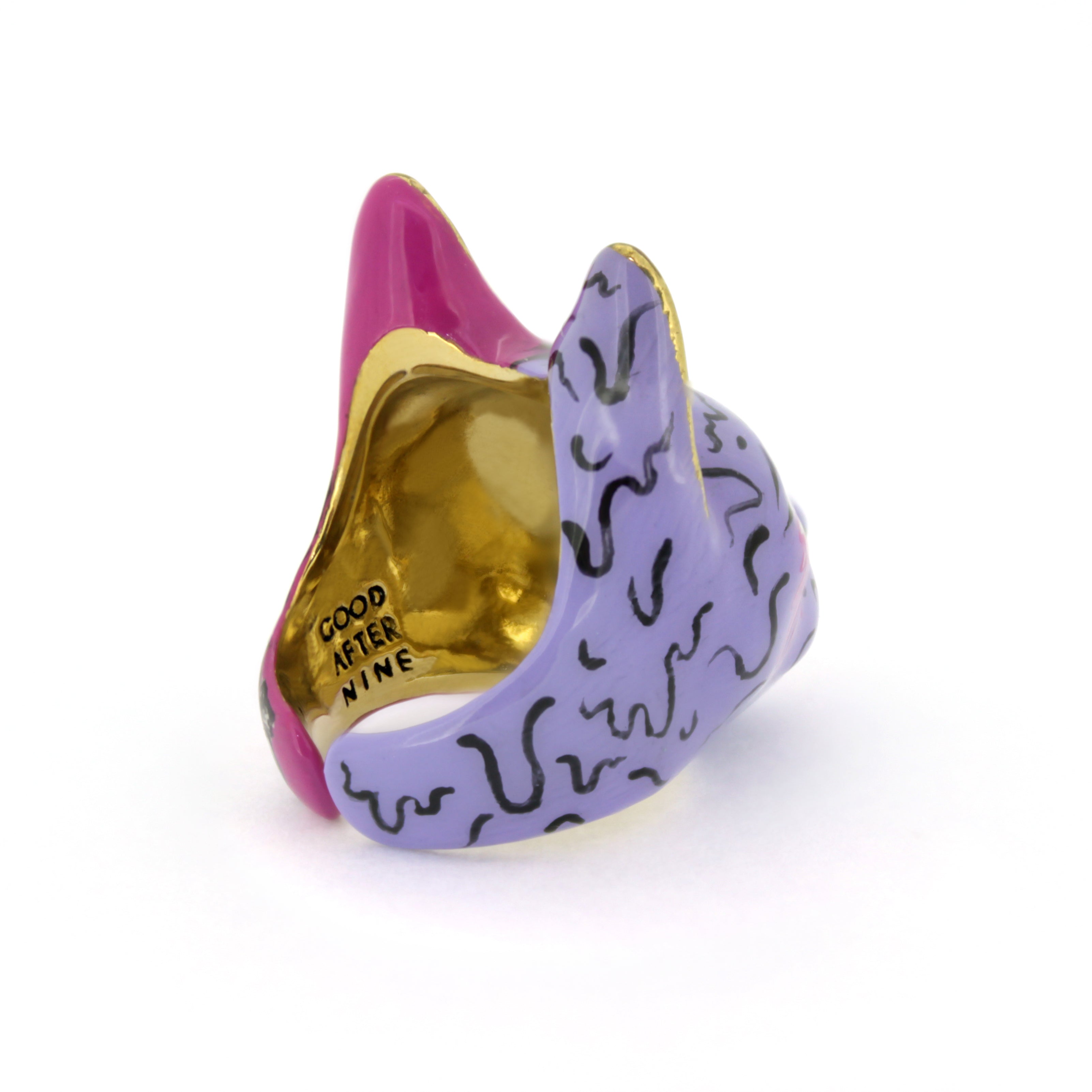 Unique zombie cat ring with a split design, showcasing a stylized skull and purple colors