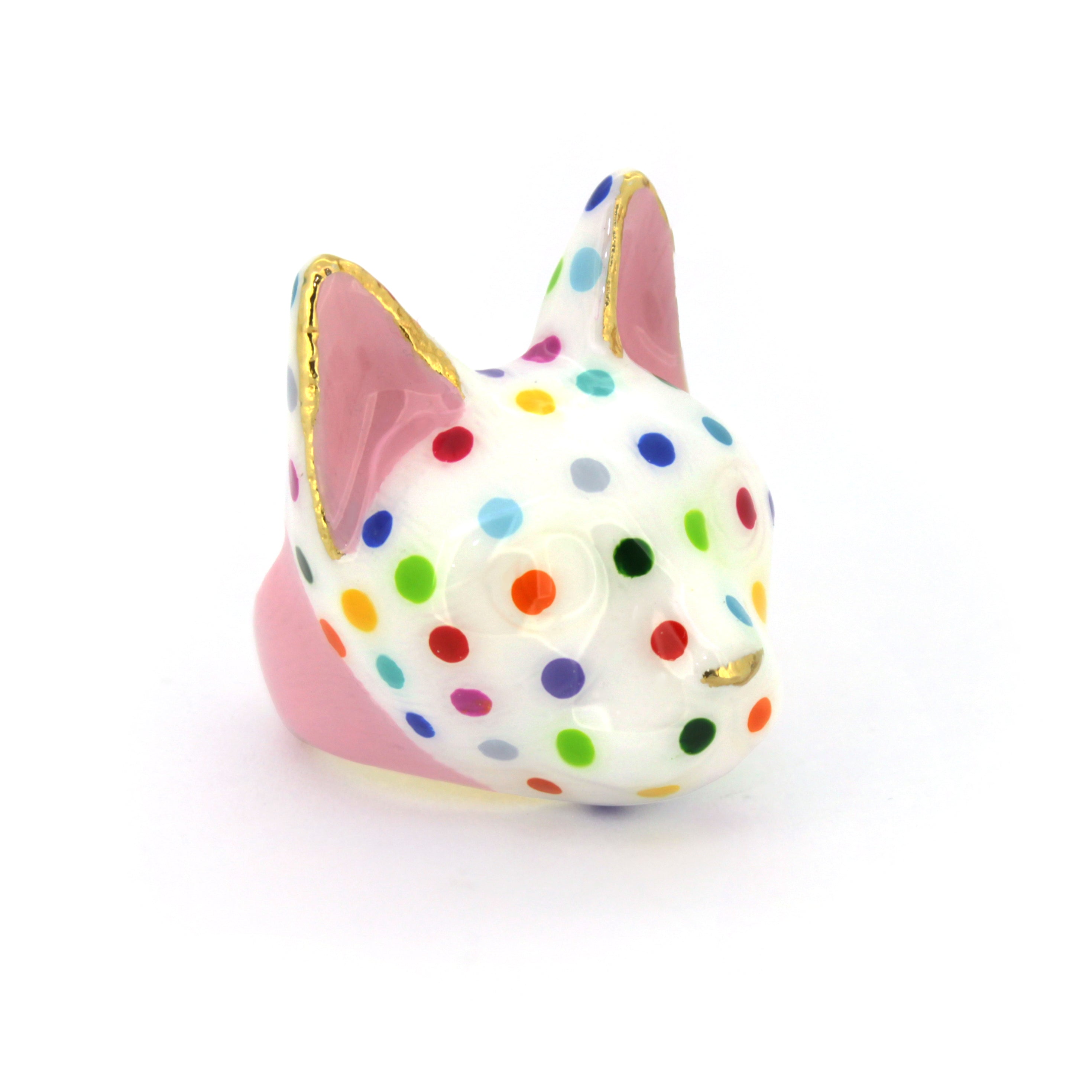 Unique cat ring with a charming design and colorful polka dots, perfect fashion lovers.