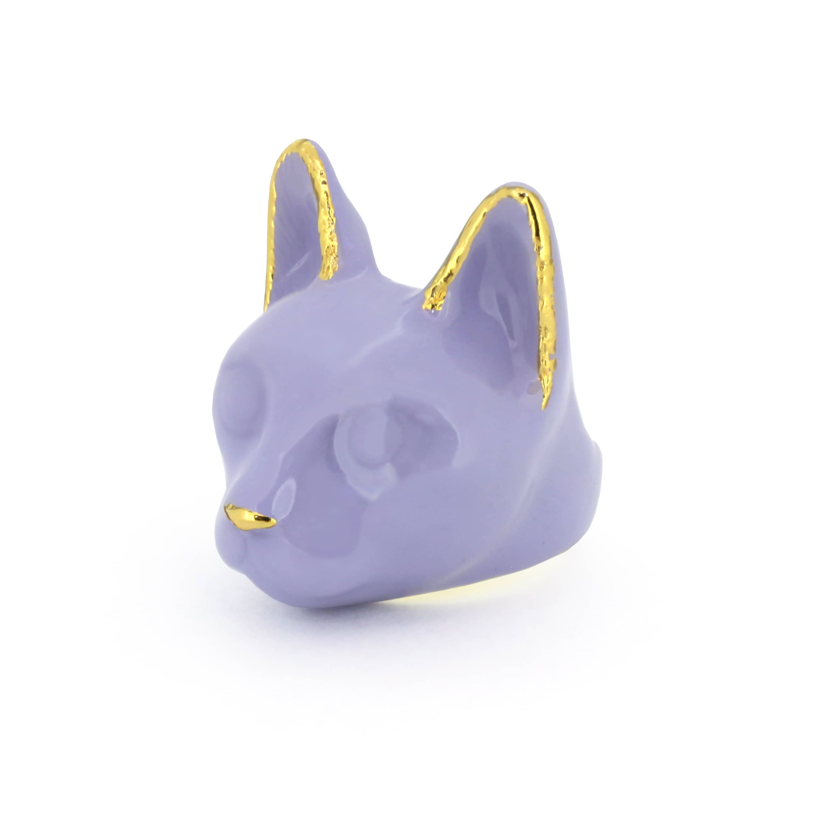 A whimsical ring designed in the shape of a cat’s head, featuring a soft lavender color.