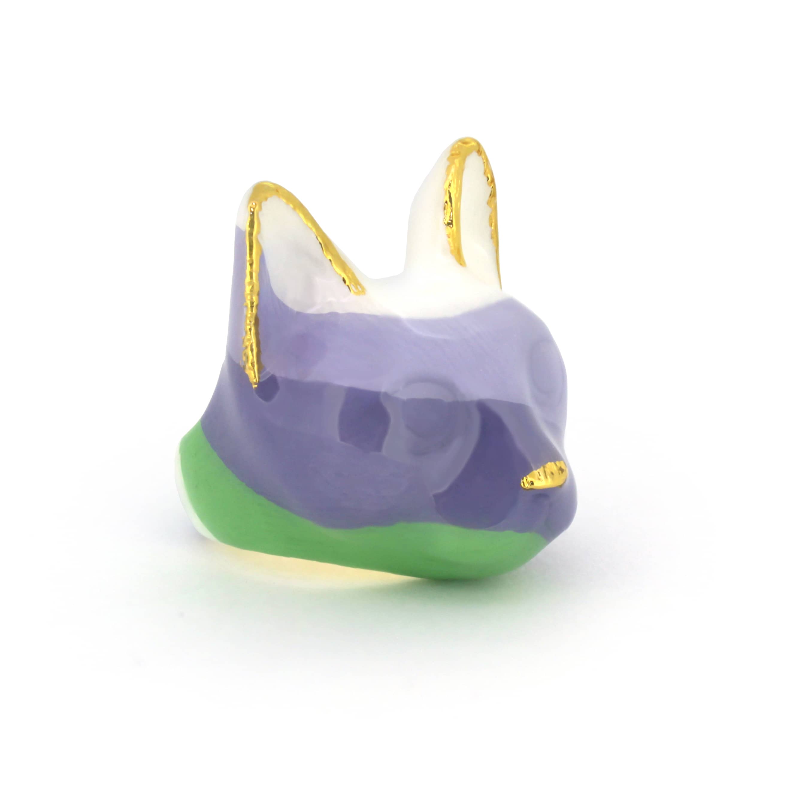 Pastel-color cat ring in lavender, green, and white with golden accents on the ears and a small gold nose.