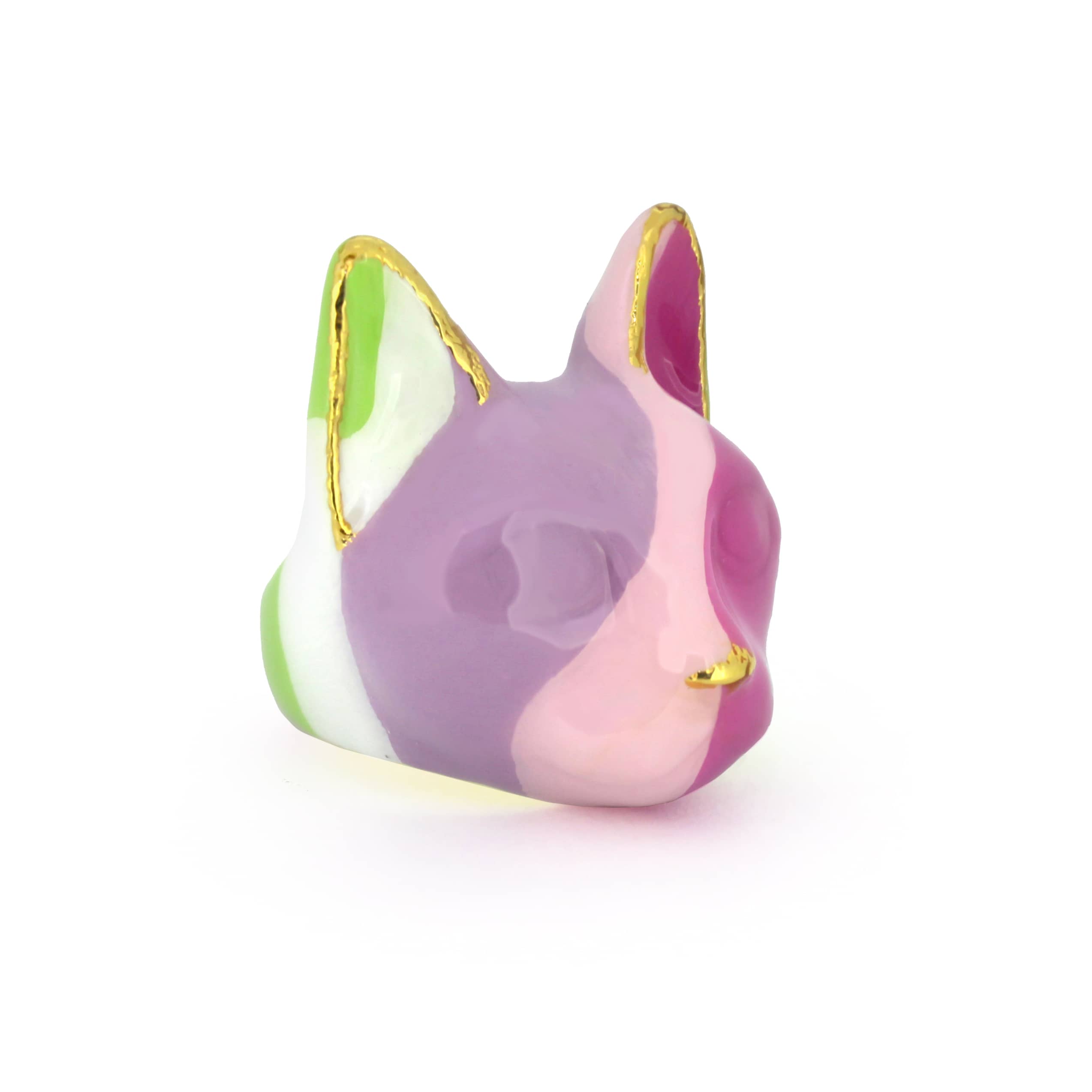 A colorful cat's head ring with geometric shapes in purple, pink, green, and white, accented by gold edges, perfect for unique jewelry lovers.