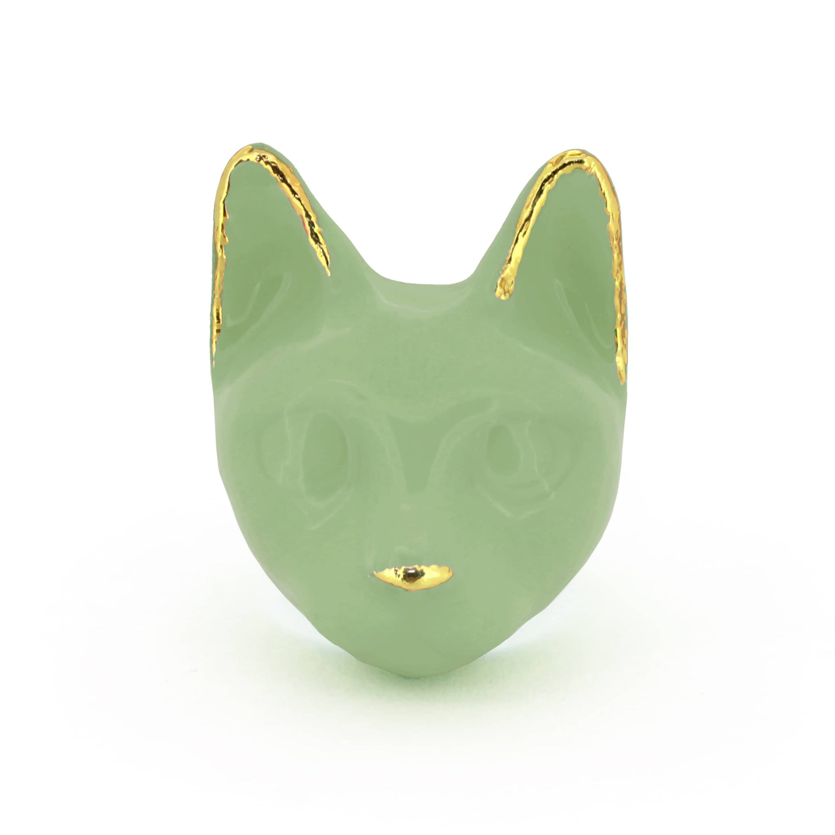 A green cat's head ring with gold accents on the ears and a small gold nose