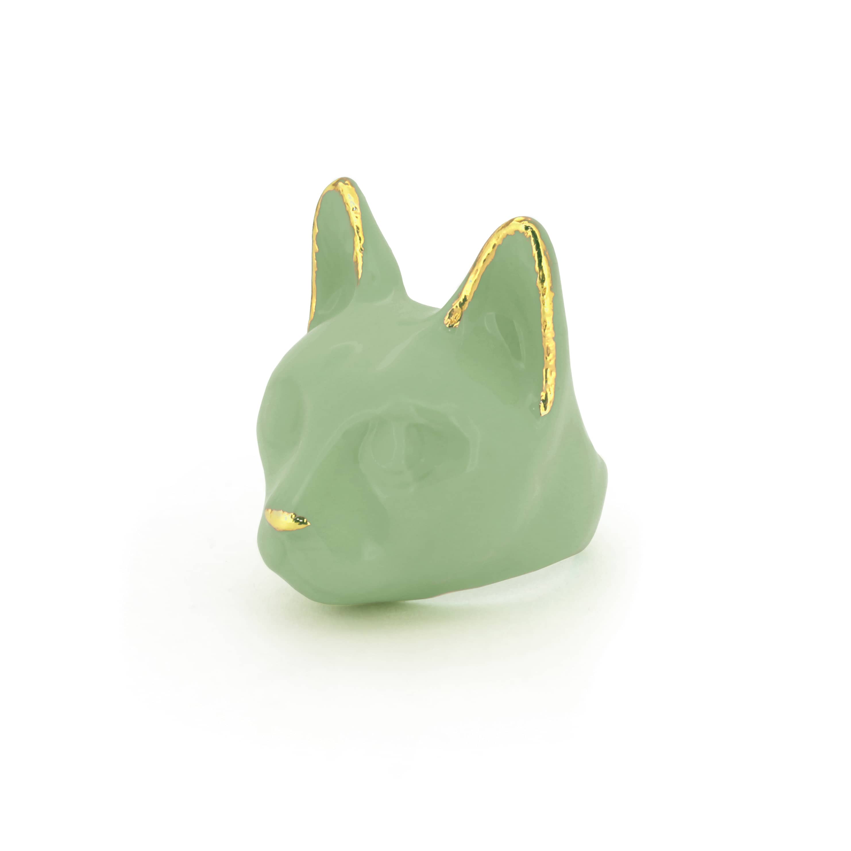 A green cat ring with gold accents on the ears and a small gold nose