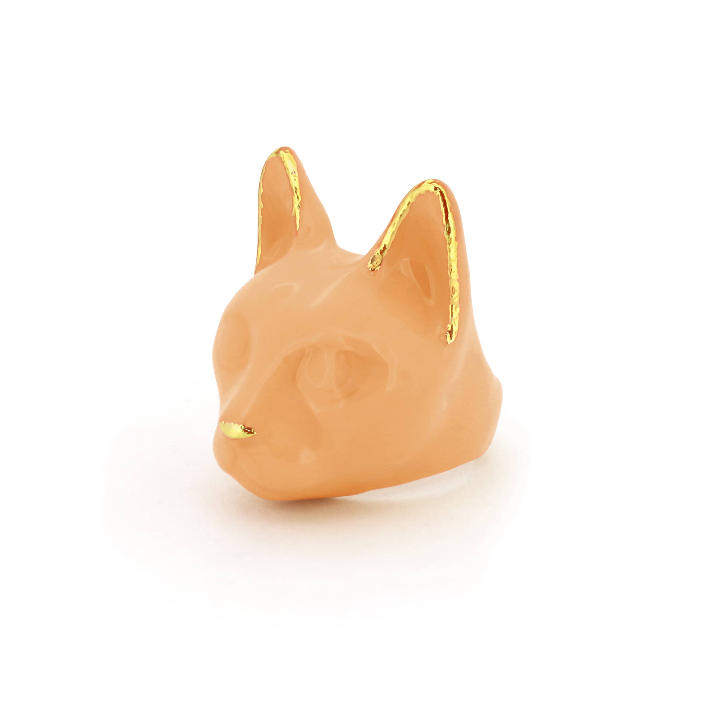 A orange cat's head ring with gold accents on the ears and a small gold nose