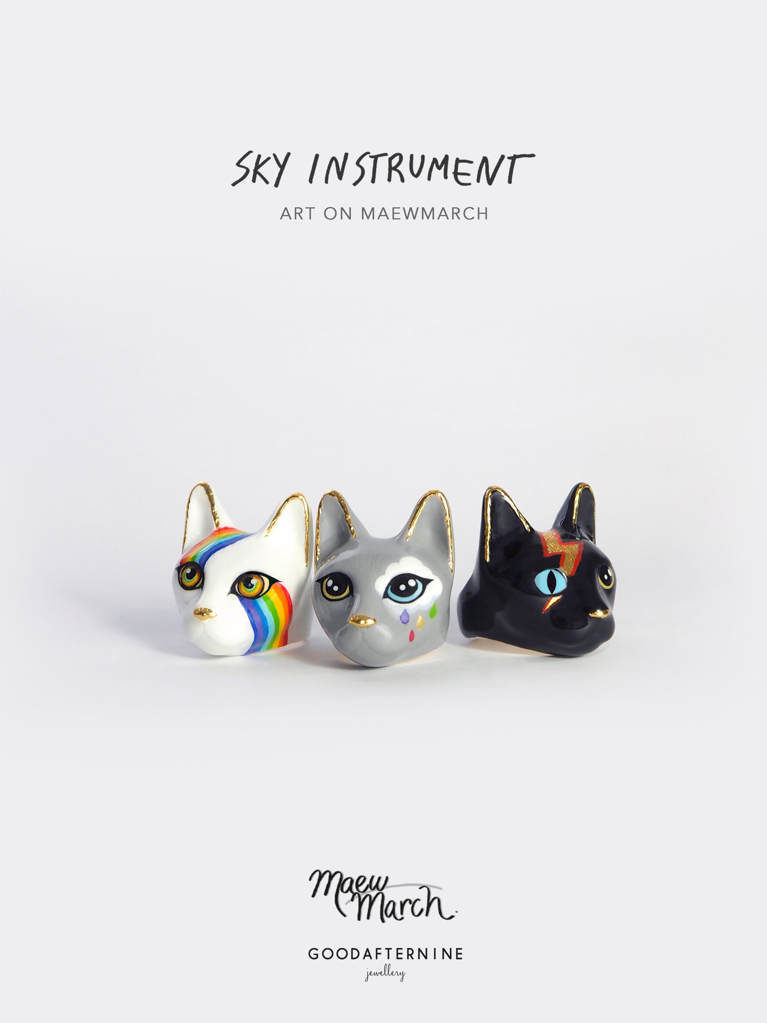 Collection of artistic cat rings with unique designs, perfect for art collectors.