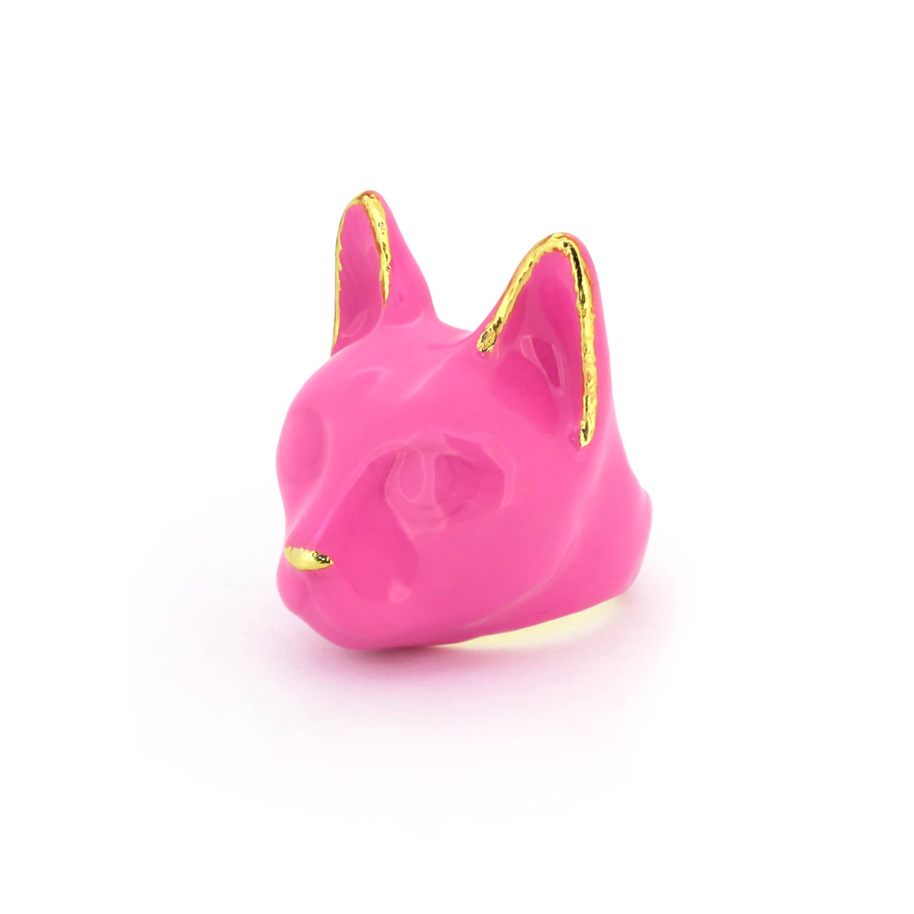 A pink cat's head ring with gold accents on the ears and a small gold nose