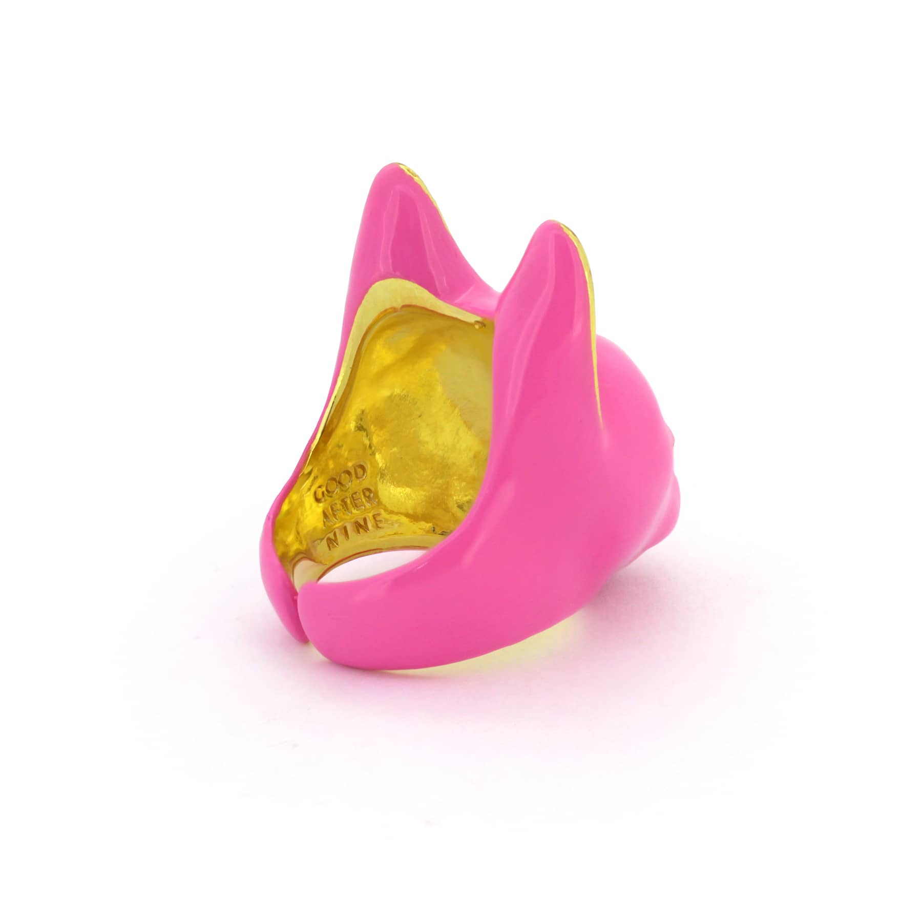 A stylish pink cat's head ring with gold accents on the ears and a small gold nose