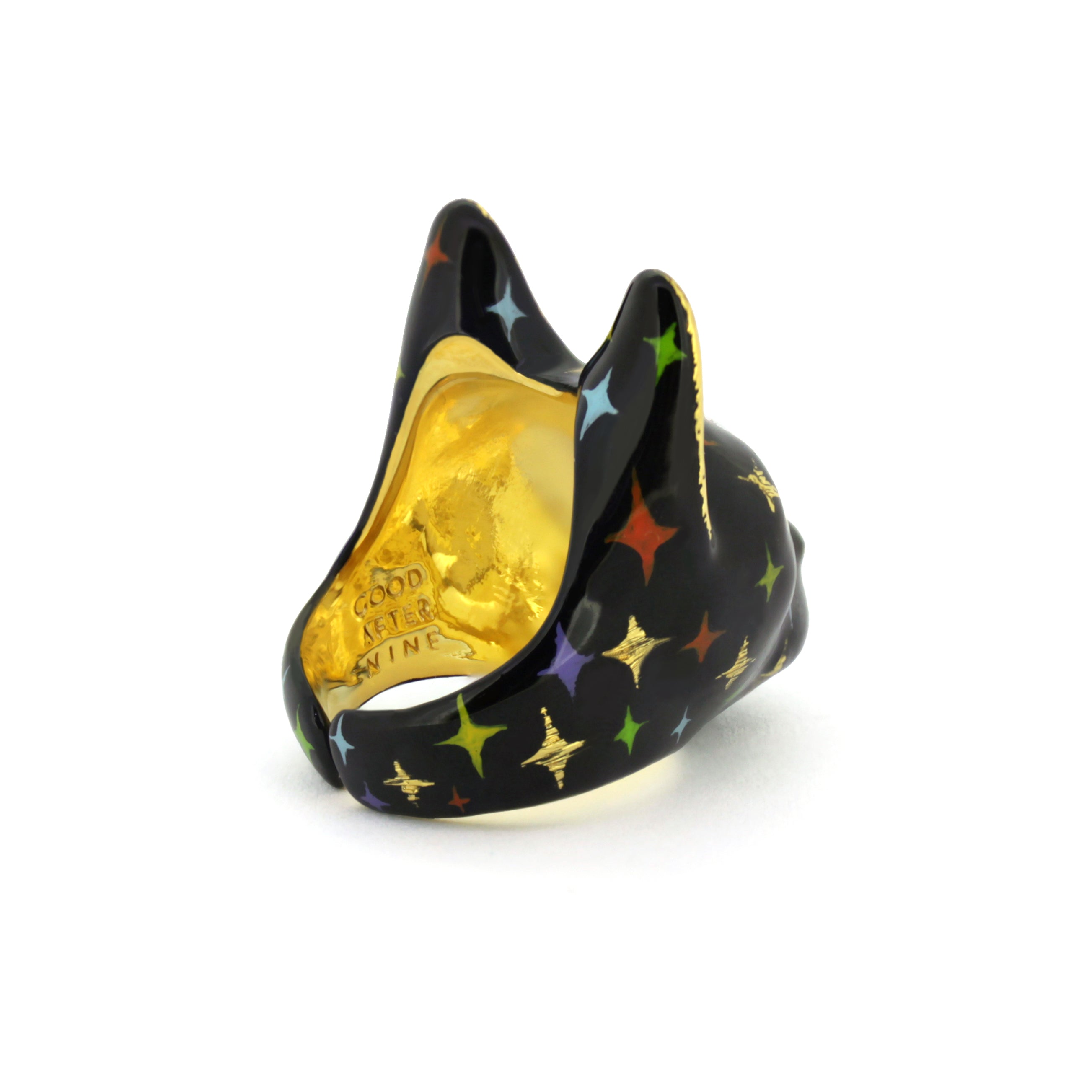 Black cat ring with playful design, featuring yellow eyes and twinkle details on its face.