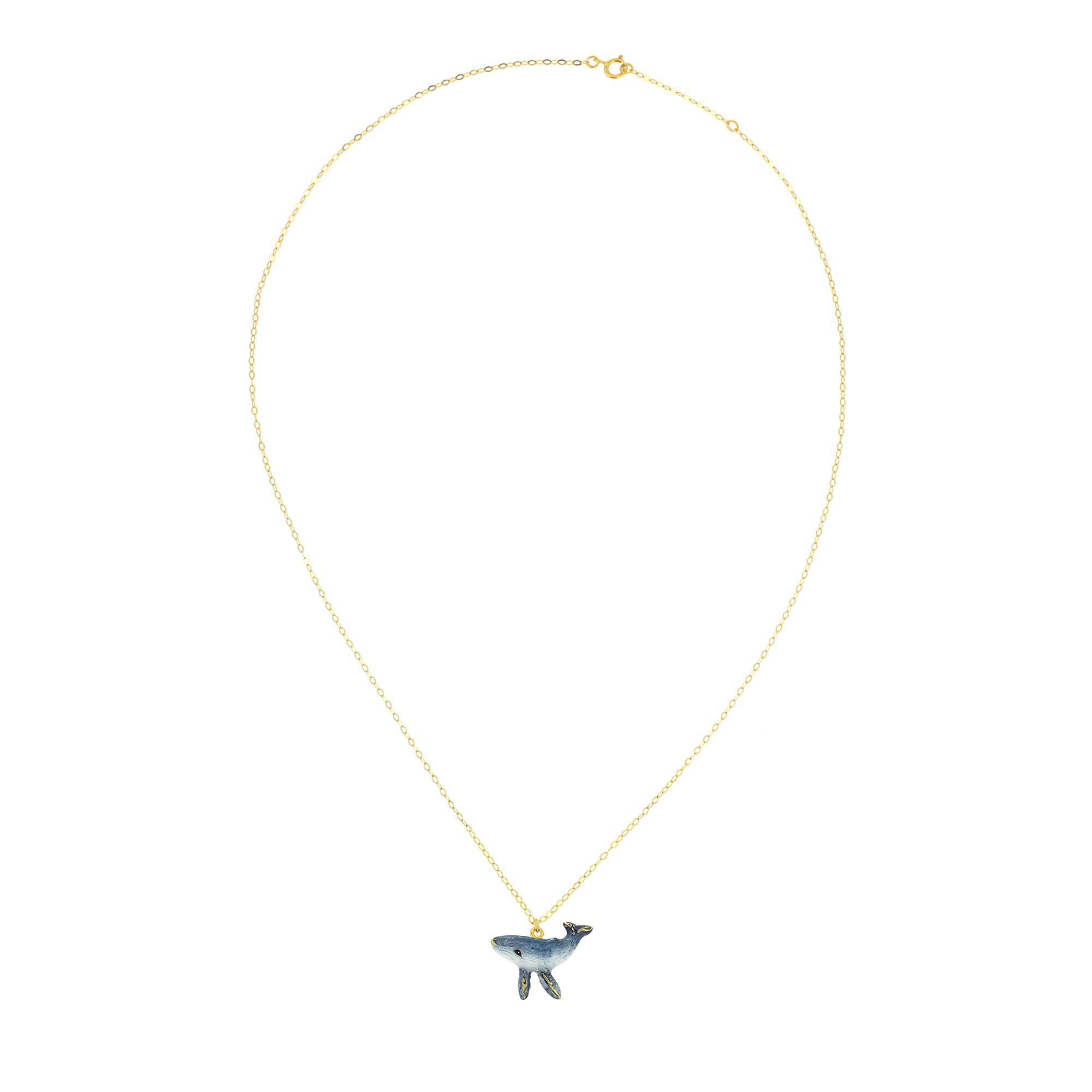Beautiful gold chain necklace featuring a whale charm