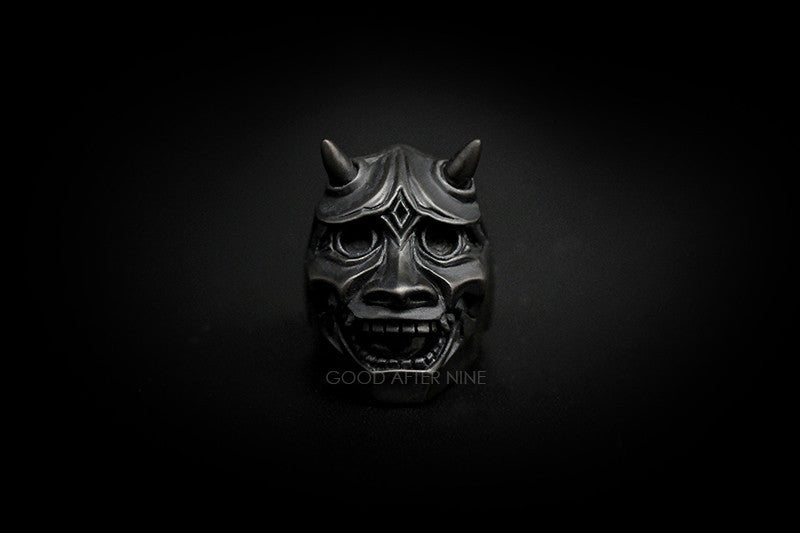Unique black demon mask ring with intricate details