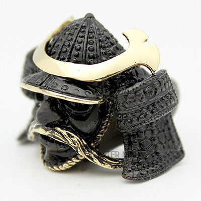 Handcrafted ring designed as a samurai helmet with intricate details, perfect for unique jewelry lovers.