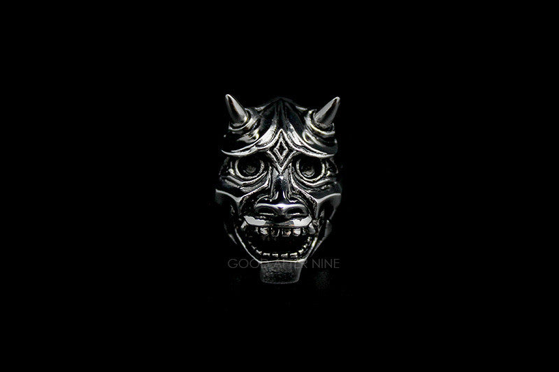 An artisan-crafted ring depicting a demon face, perfect for unique jewelry lovers.