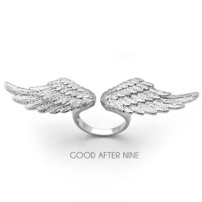Beautiful silver ring featuring intricate wing details.