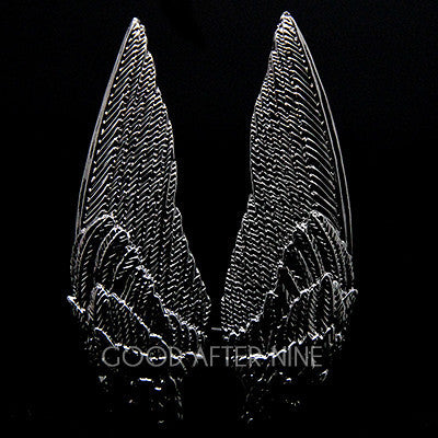 Unique winged ring design with intricate detailing