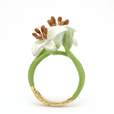Handmade ring featuring two white flowers with brown stamens, set on a green band, perfect for flower lovers.
