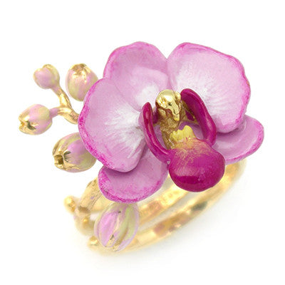 Handcrafted gold ring featuring a purple phalaen design with intricate details.