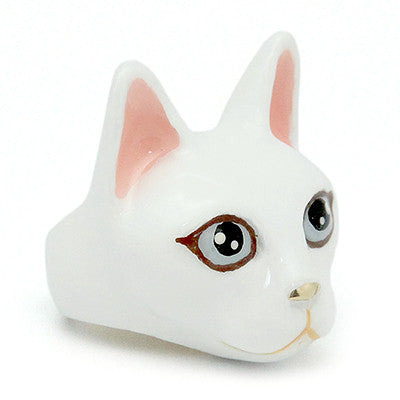 Handmade white cat head ring with large black eyes, pink ears, and a small nose, perfect for cat lovers.