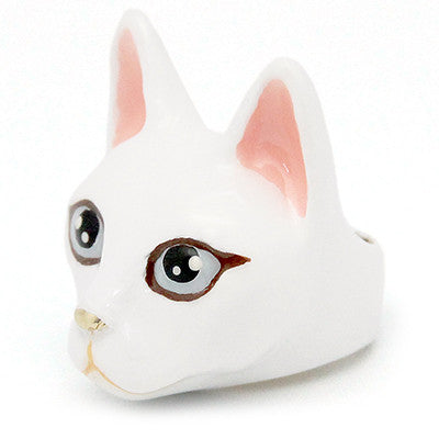 Handmade white cat head ring with large black eyes, pink ears, and a small nose, perfect for cat lovers.