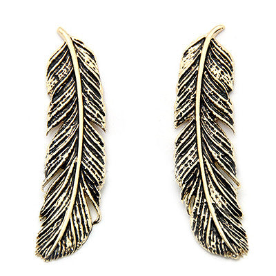 Statement silver earrings with a stunning feather design.