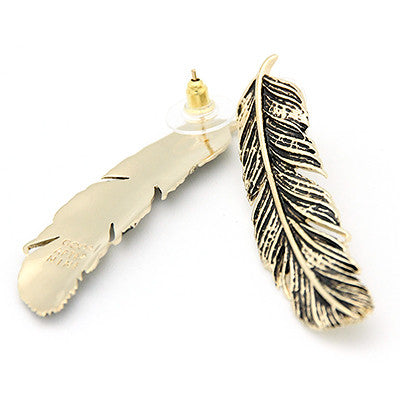 Statement silver earrings with a stunning feather design.