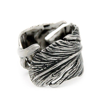 Handcrafted silver ring with a unique feather design
