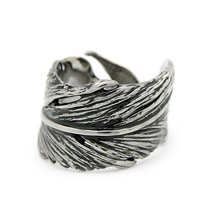 Handcrafted silver ring with a unique feather design