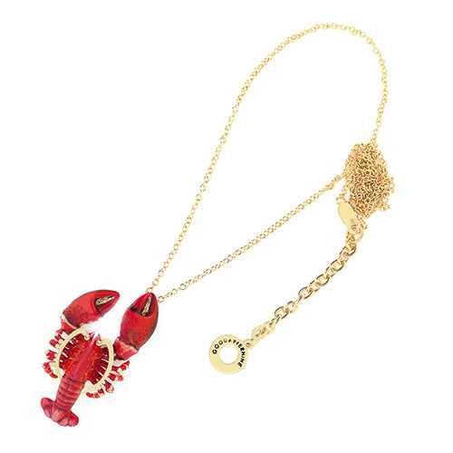 Charming lobster-shaped pendant necklace with gold accents on a delicate chain.
