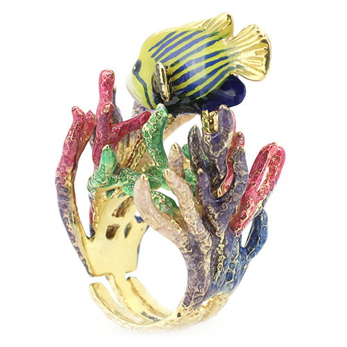 A vibrant ring featuring a colorful fish and coral design.
