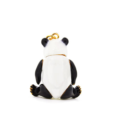 Unique black and white panda pendant on a gold chain, perfect for animal lovers.