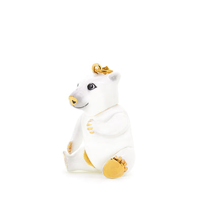 White bear pendant featuring a cute design with black eyes and a gold nose, perfect for animal lovers.