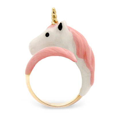 A whimsical unicorn ring featuring a pink and white design with a golden band, perfect for anyone who loves unique, fantasy-inspired jewelry.