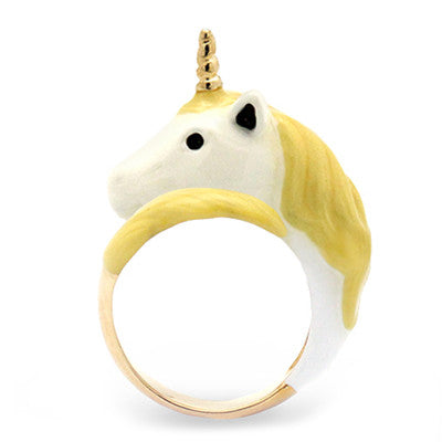 A adorable unicorn ring featuring a yellow and white design with a golden band.