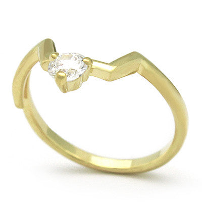 Unique gold jewelry featuring a Swarovski gemstone.