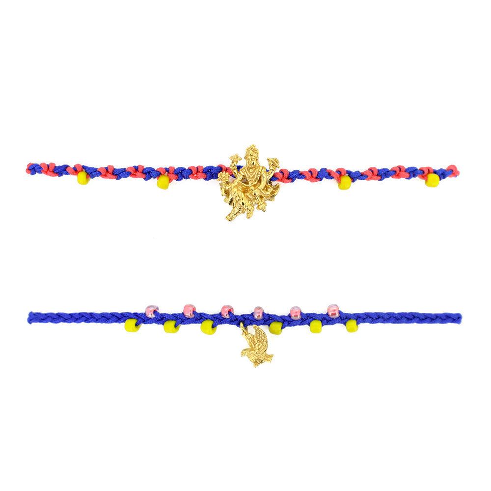 Two bracelets in blue and red threads with colorful beads, featuring a gold Trimurti Shiva charm and a gold garuda charm.