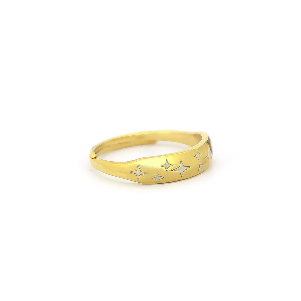 Beautiful gold ring with stars design on its band.