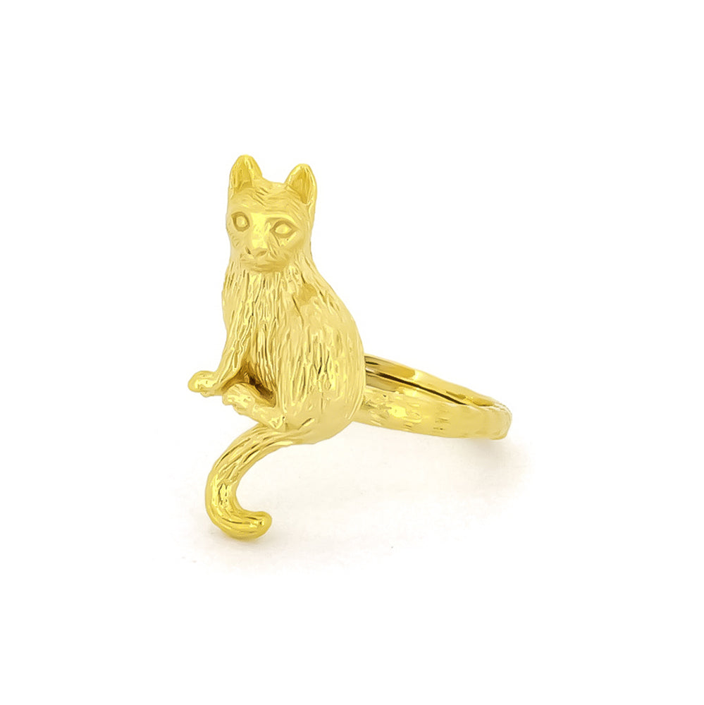 A handcrafted gold ring featuring a sitting cat design, highlighting the fur's details and facial features.
