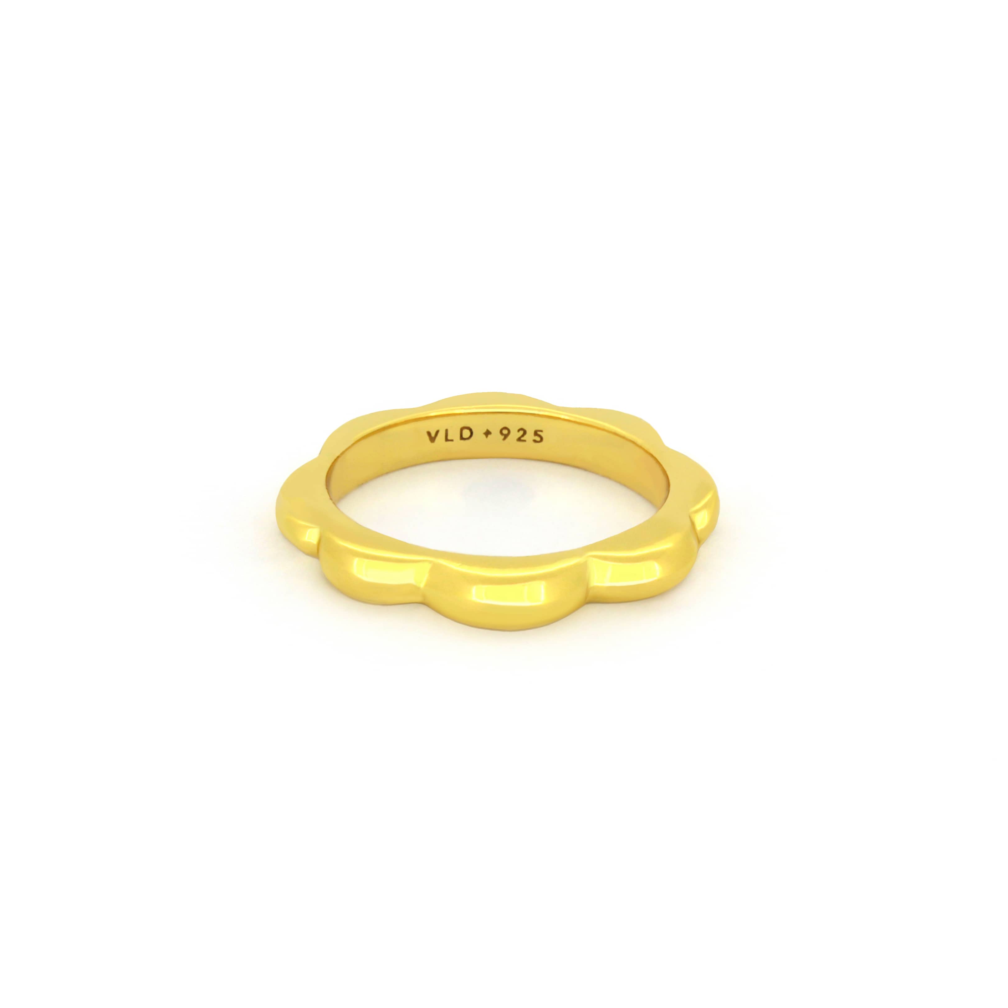 Modern, minimal gold-plated ring ideal for stacking.